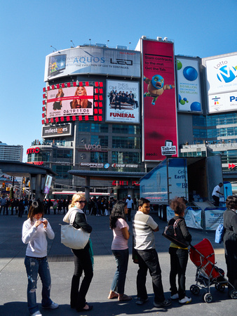 Lining Up for Free Pitchers and Filters in Yonge-Dundas Square